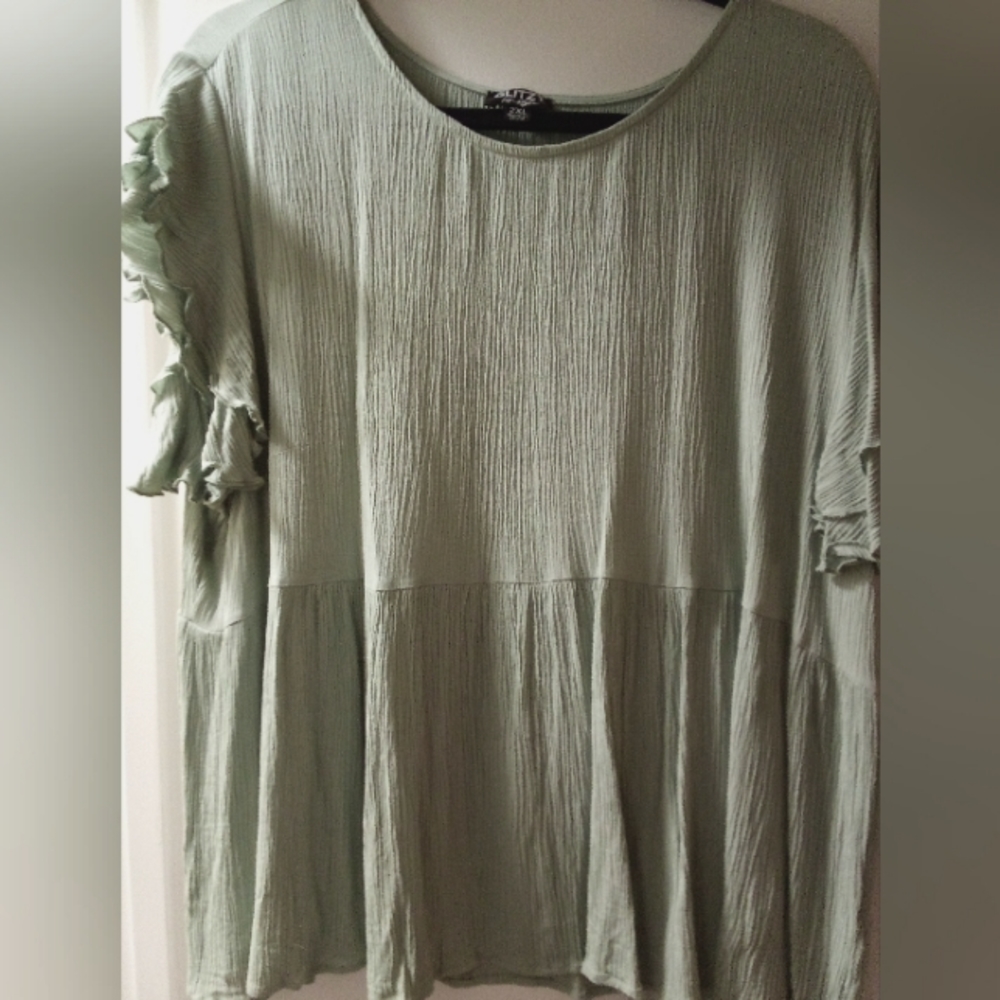 Women's Baby Doll Blouse in a celery green color from Glitzy Girl